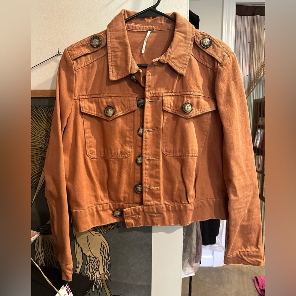 Denim jacket with statement buttons